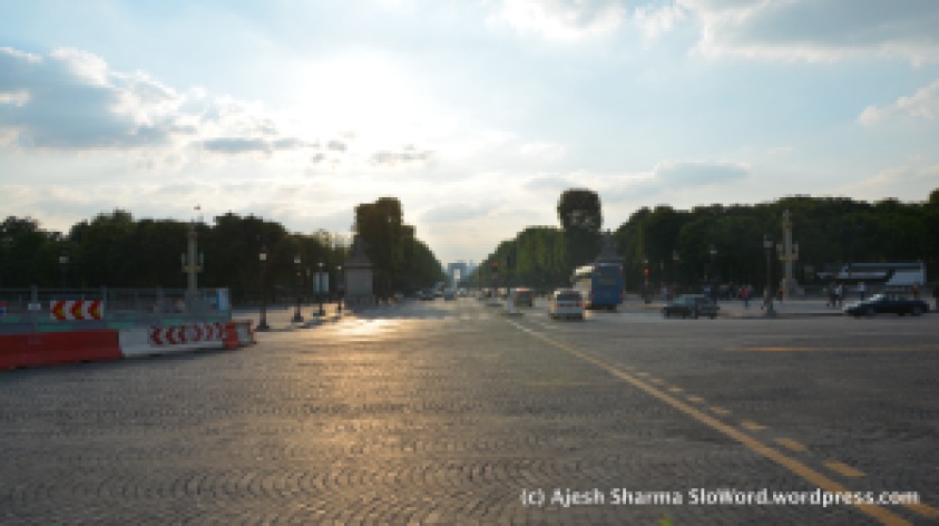 From the Place de la Concorde the Champs Elysees stretches away into the dying sun